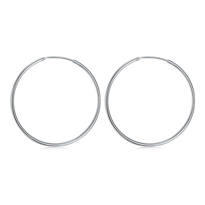 Round Earring with Smooth Surface and Silver Trim - goldylify.com