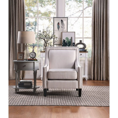 armchair with nailheads and solid wood legs - goldylify.com